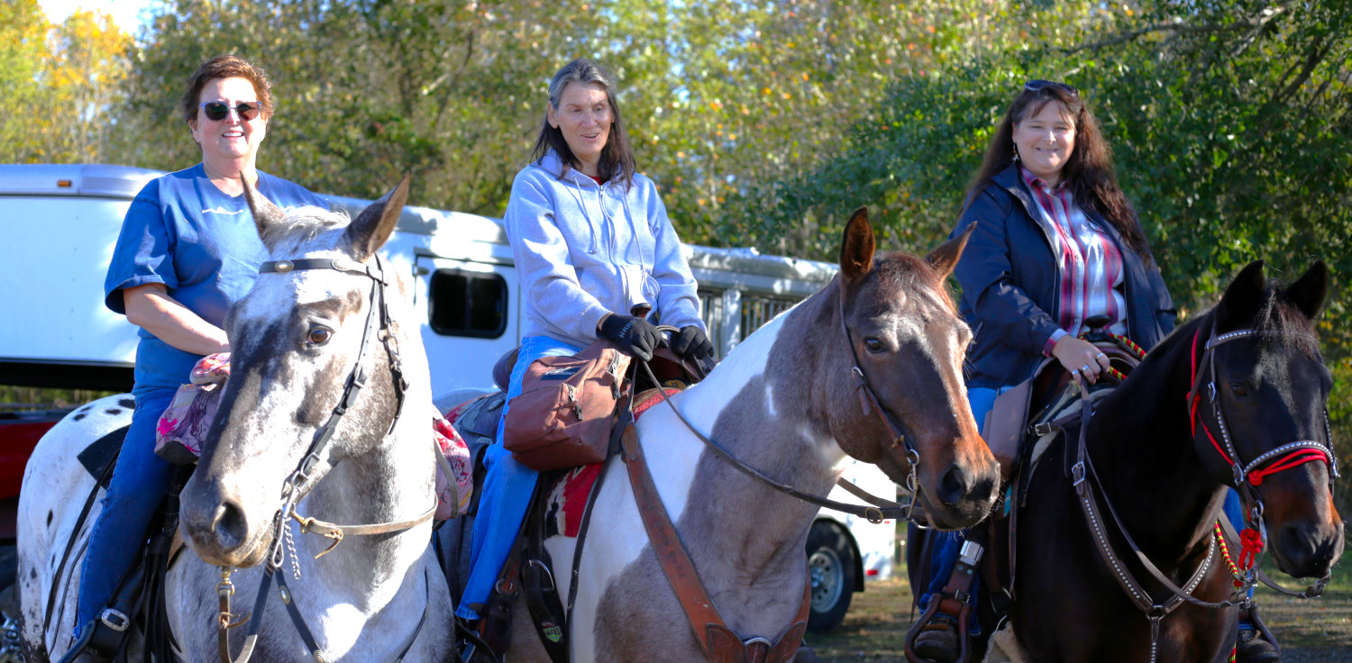 Theresa Goddard of Hawkins, Jayne Smart of Lindale and Tracy Stephens of Hawkins mount up on a Saturday morning at the Nature Preserve Derby for a trail ride.